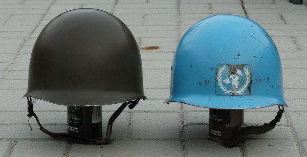 Two Dutch M53 helmets made by LS